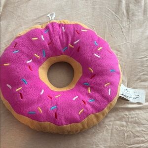 The Simpsons” Pink Donut Pillow.